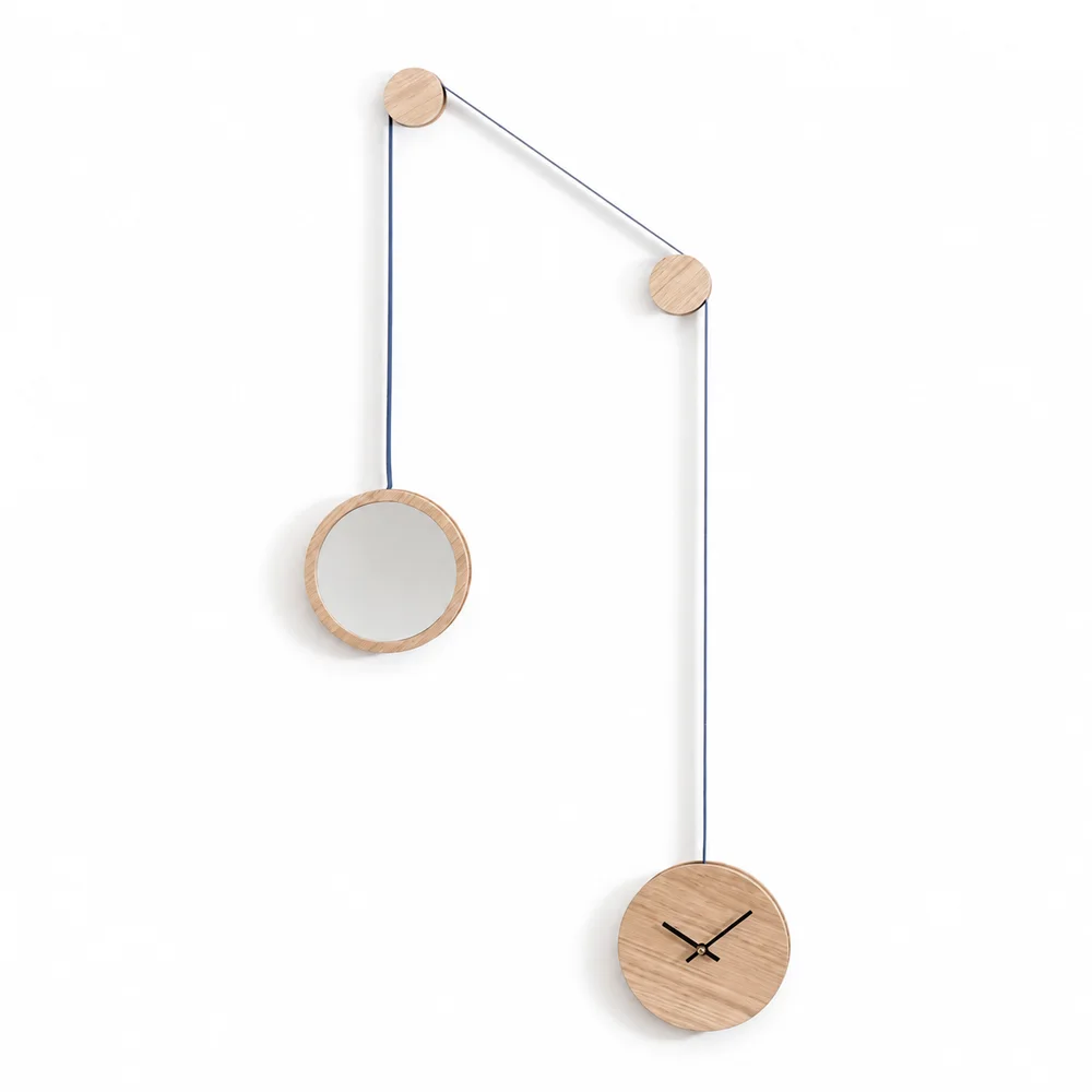 Horloge-miroir PENDULE sur fond blanc